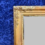 Miroir époque empire en bois et stuc doré circa 1810-1820
