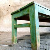 Old wooden bench sidetable green