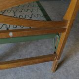 Bed with green metal braces 1960 a person foldable