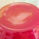 Pot-bellied, art deco vase in speckled ruby red multi-layered glass, white interior