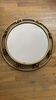 Miroir doré Holywood Regency en métal doré