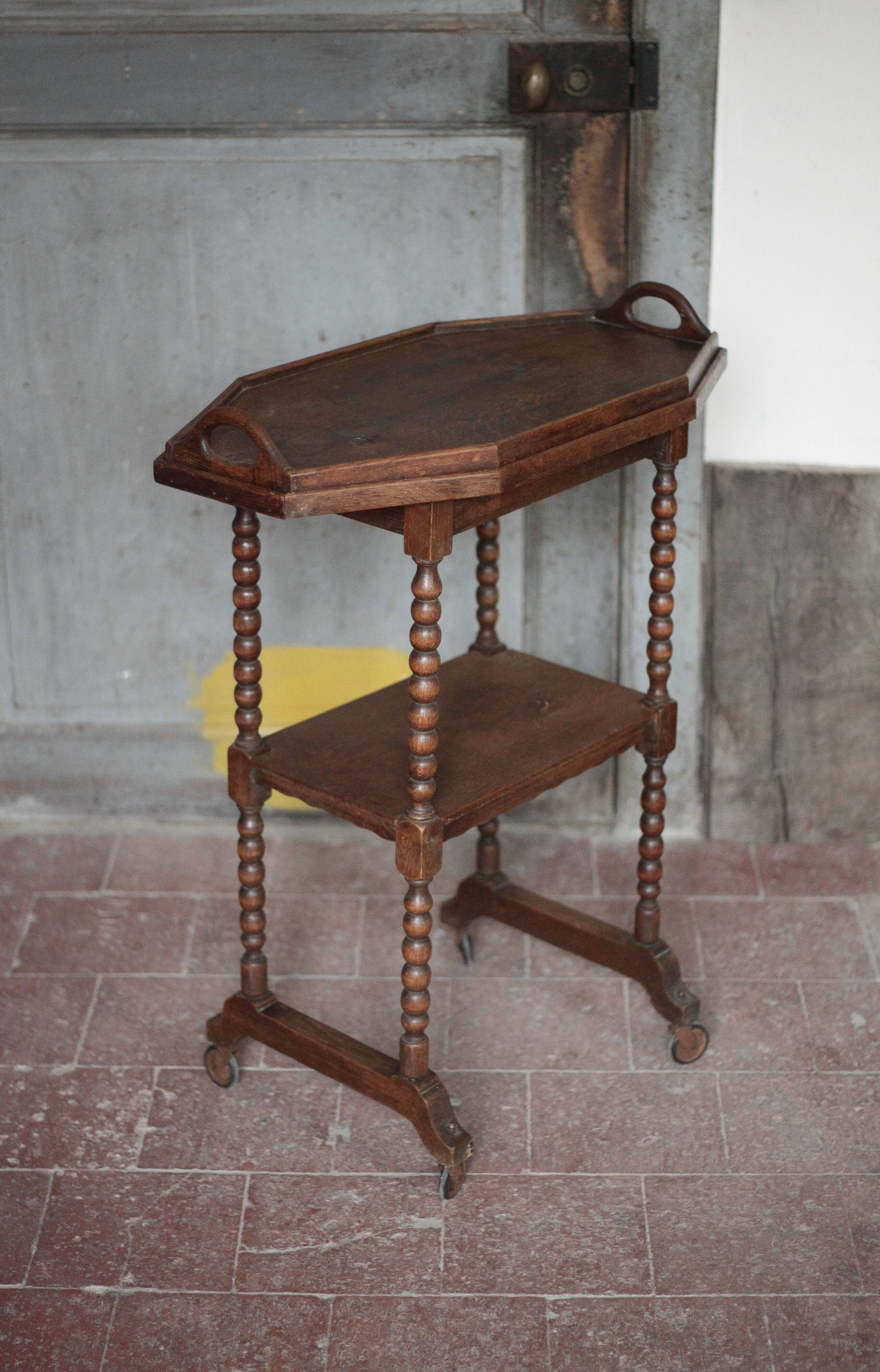 Vintage turned wood dessert trolley, wheeled table with removable top.