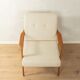 Elegant mid-century armchair from the 1960s with cream-white upholstery
