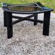 Table basse design des années 70 en bois laqué noir plateau en verre fumé