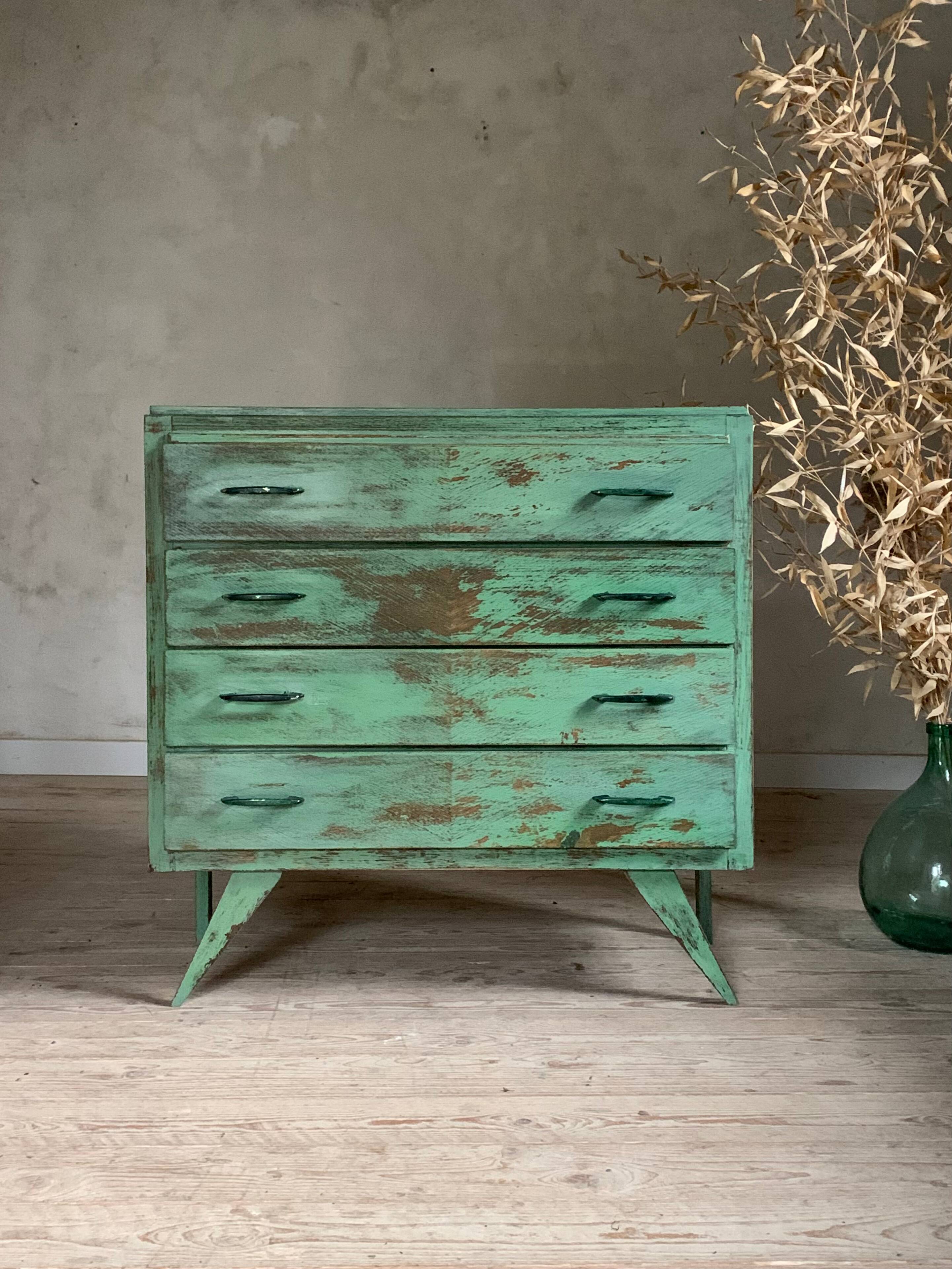 Vintage compass leg commode with a patina.