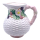 Pale pink slip decanter and colorful fruist