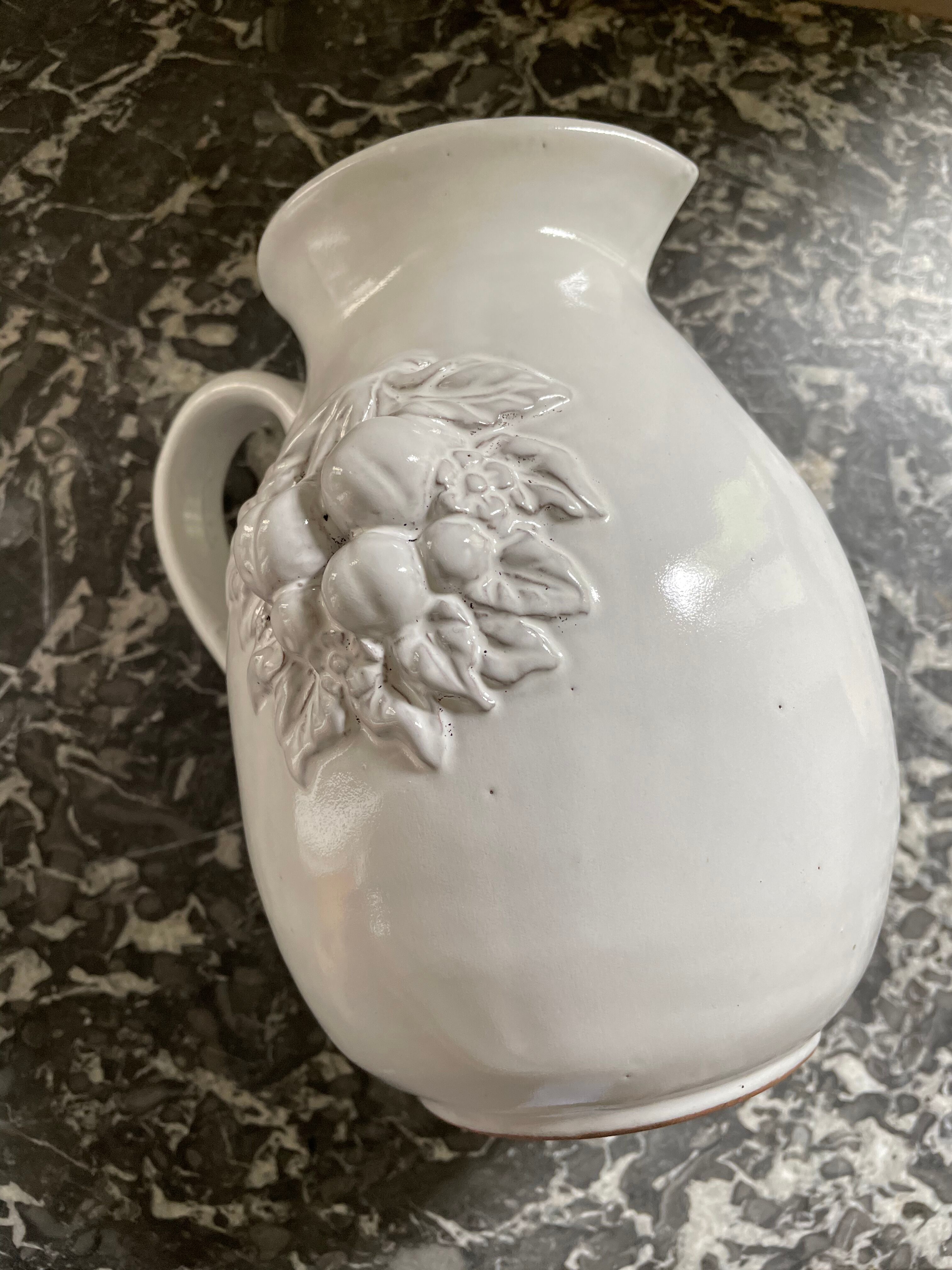 Pitcher in dabbling cherry decoration