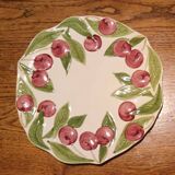 Longchamp barbotine plate with cherries from the early 20th century.