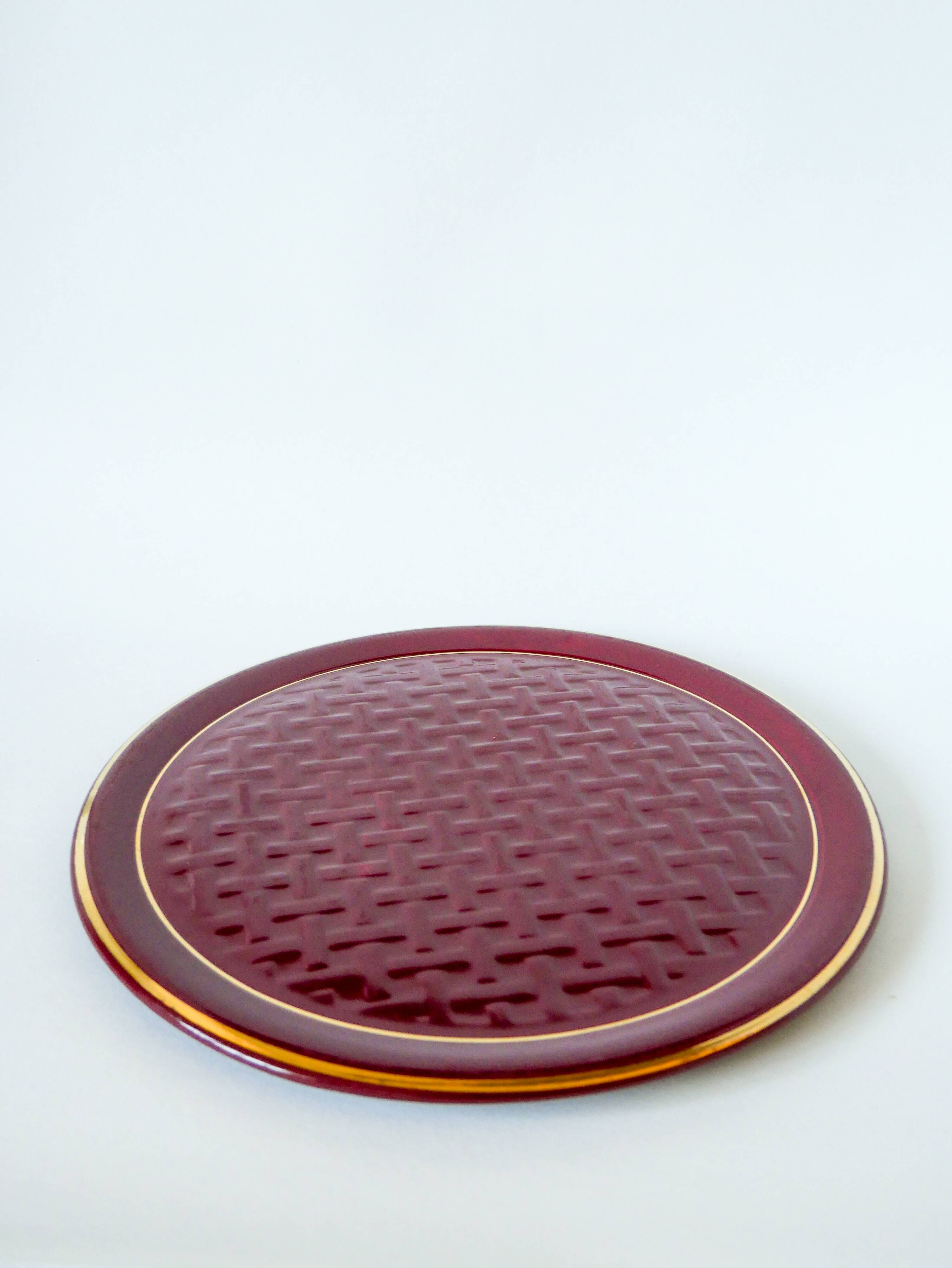 Large burgundy barbotine ceramic cake dish with braided effect 1960