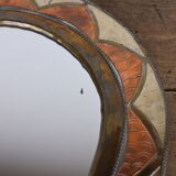 Decorated brass mirror.