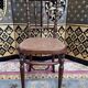 Suite de 8 chaises de bistrot en cannage FISCHEL