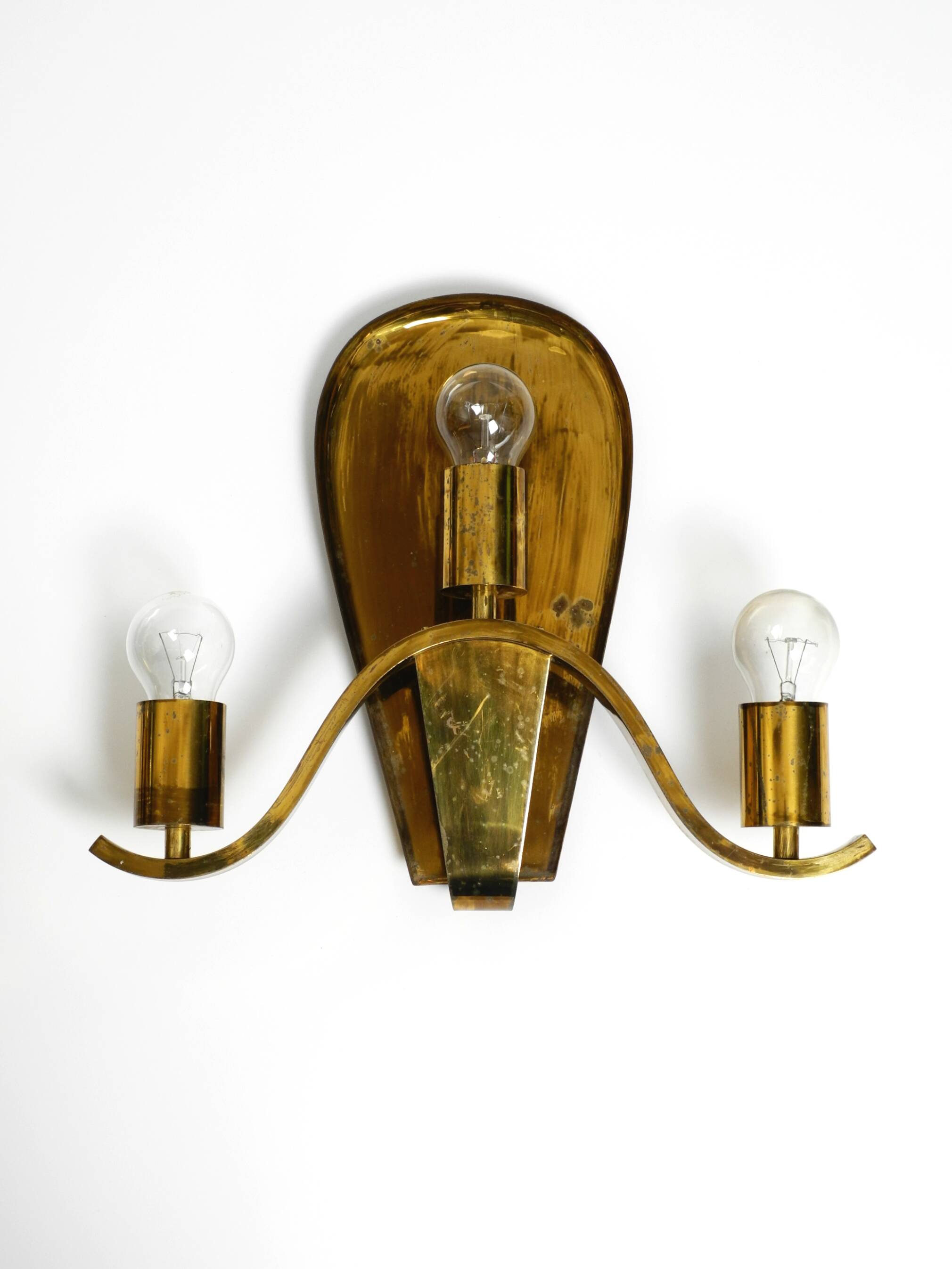 Pair of large heavy Mid Century brass wall lights from a German church