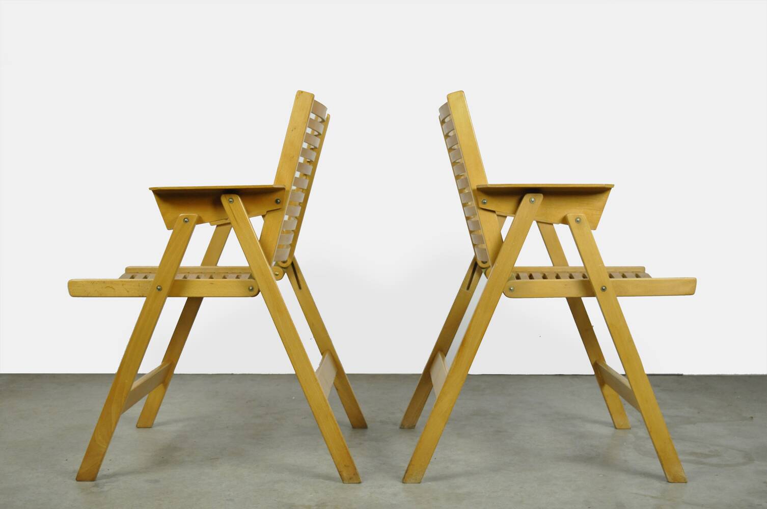 Original vintage foldable dining chairs by the Slovenian architect Niko Kralj (1920-2013) for Stol