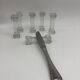 6 Portieux Art Deco knife rests in transparent moulded glass, French glassware from the 1930s.
