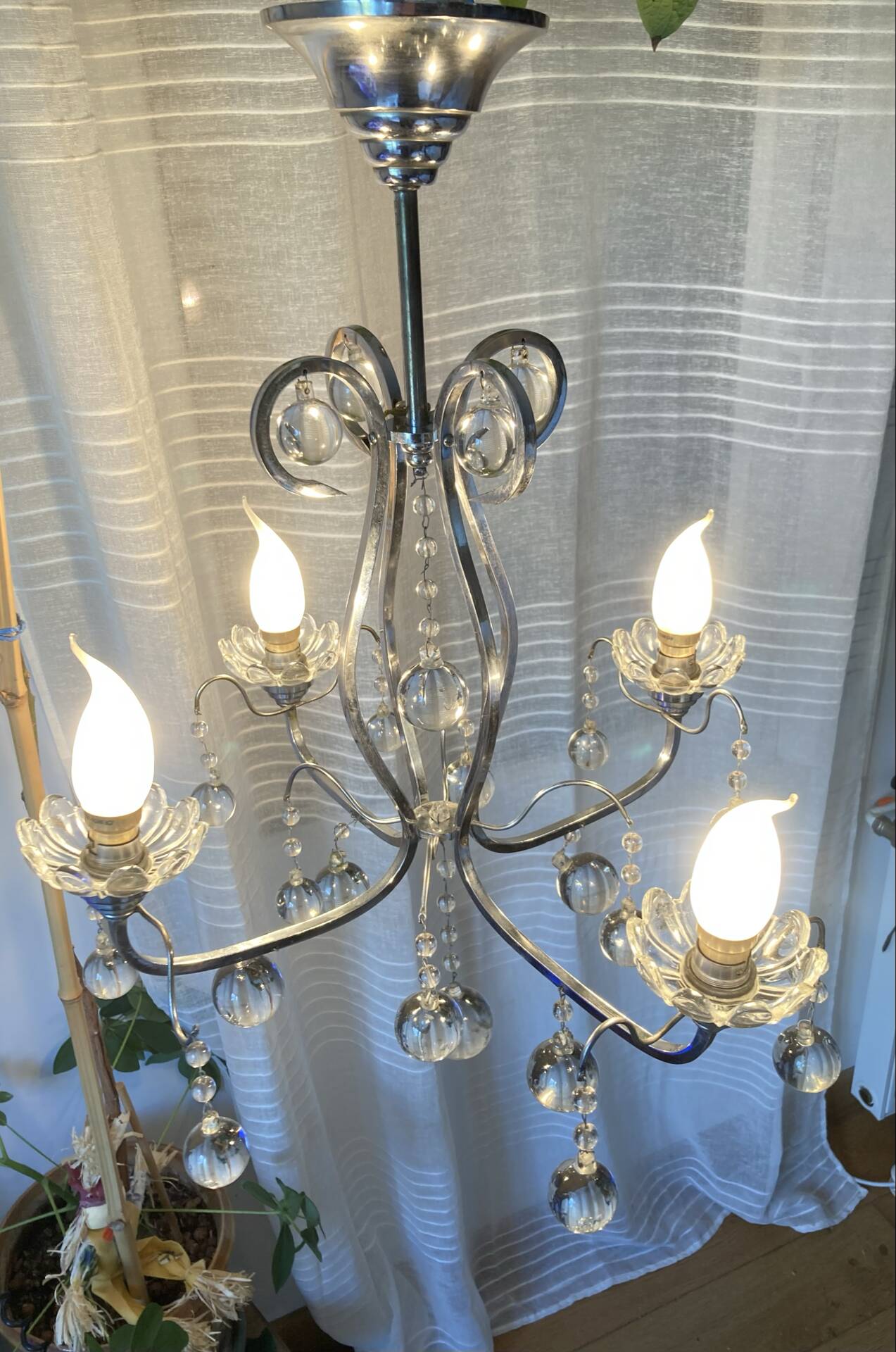 Art Deco chandelier from the early 20th century in chrome brass, with glass pendants.