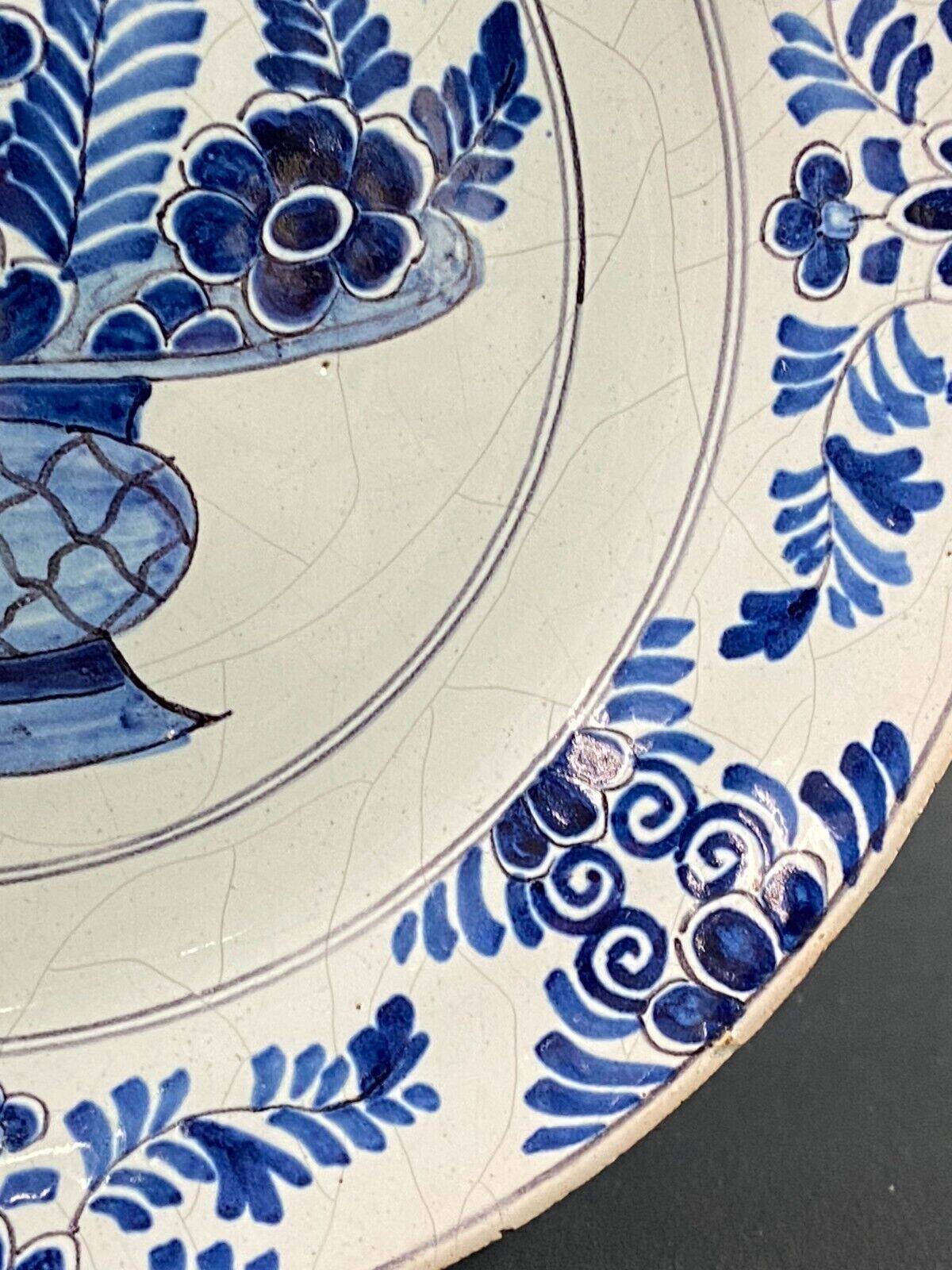 17th-18th century Delft earthenware plate signed AK Adriaen Kocx 1690-1701