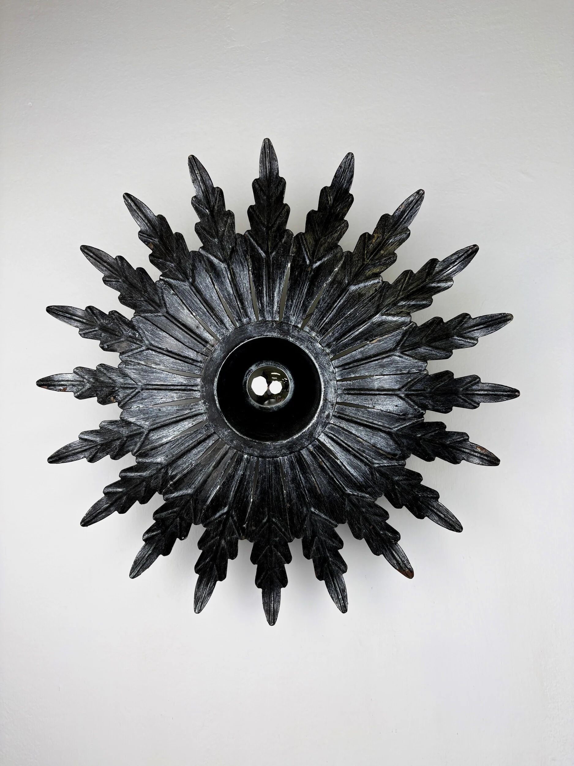 Spanish sunburst ceiling light – dark gilt metal rays, 1950s
