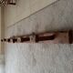 Old wall-mounted coat rack from a stable, folk art.