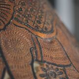 Liane and metal floor lamp with perforated leather shade featuring elephant patterns, lise.