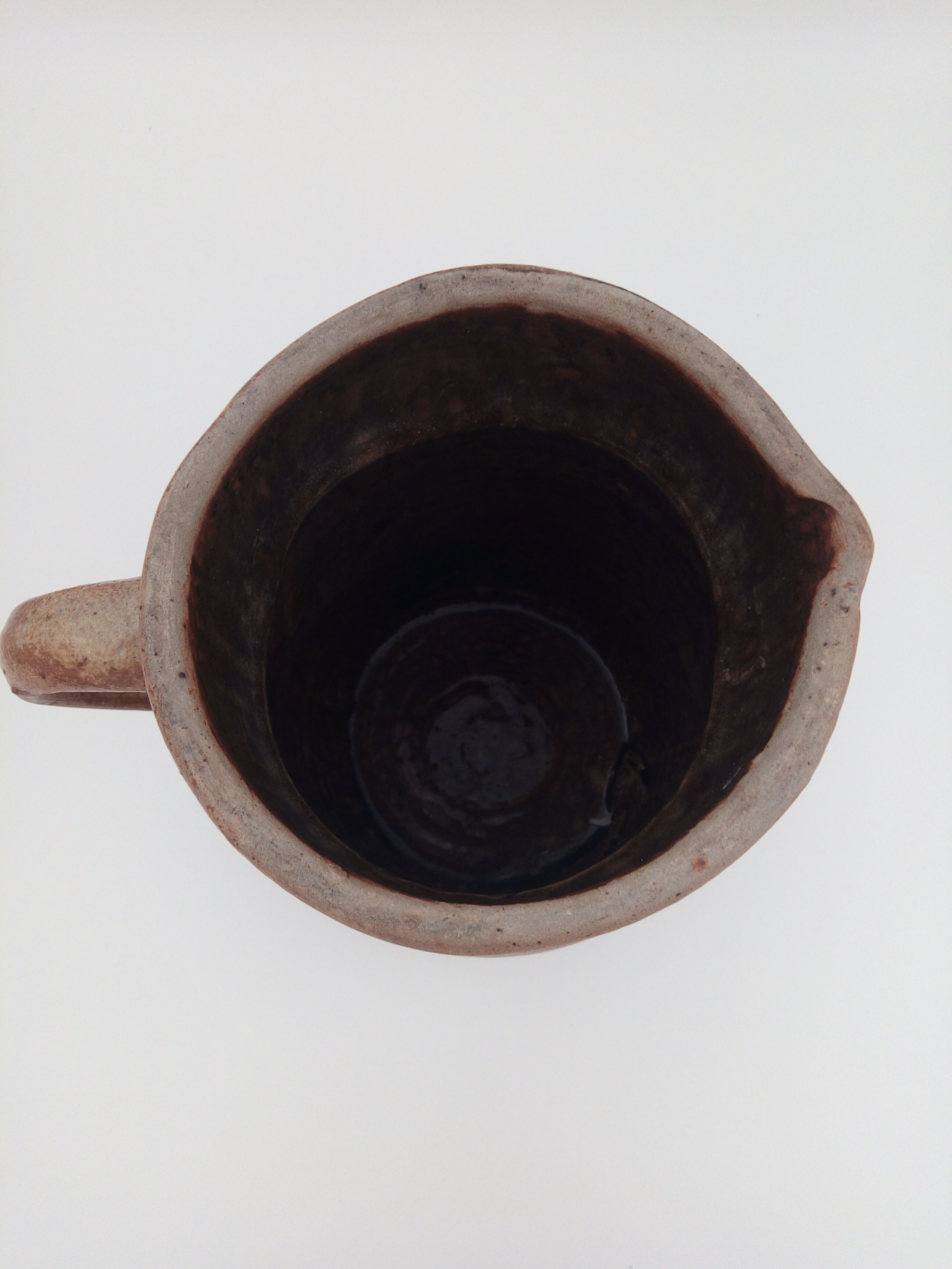 Pitcher in folk art sandstone