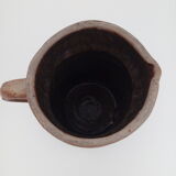 Pitcher in folk art sandstone