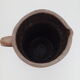 Pitcher in folk art sandstone