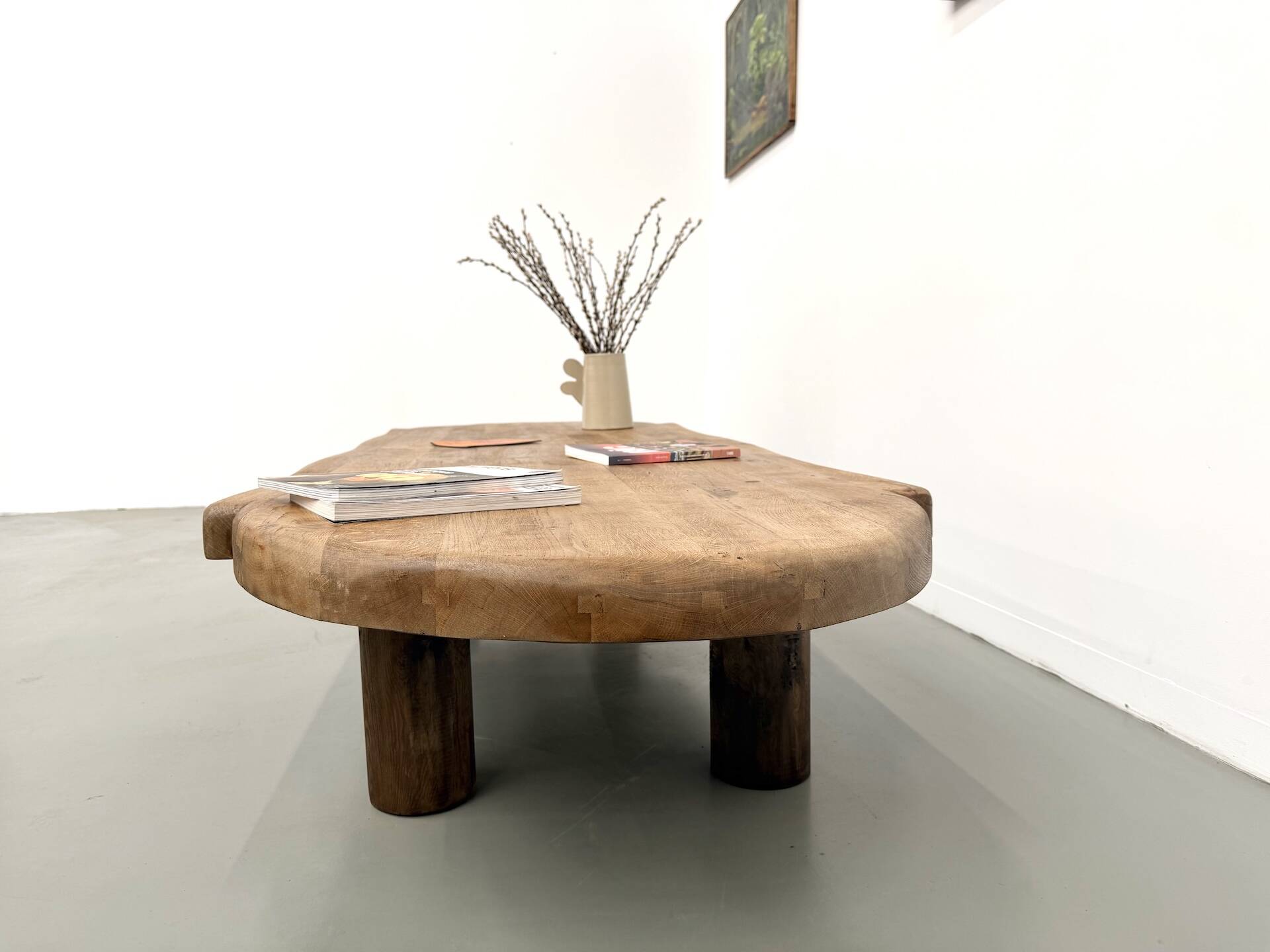 XXL oval coffee table in solid oak, cylindrical base, 1950s.