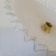 Toothed opaline suspension