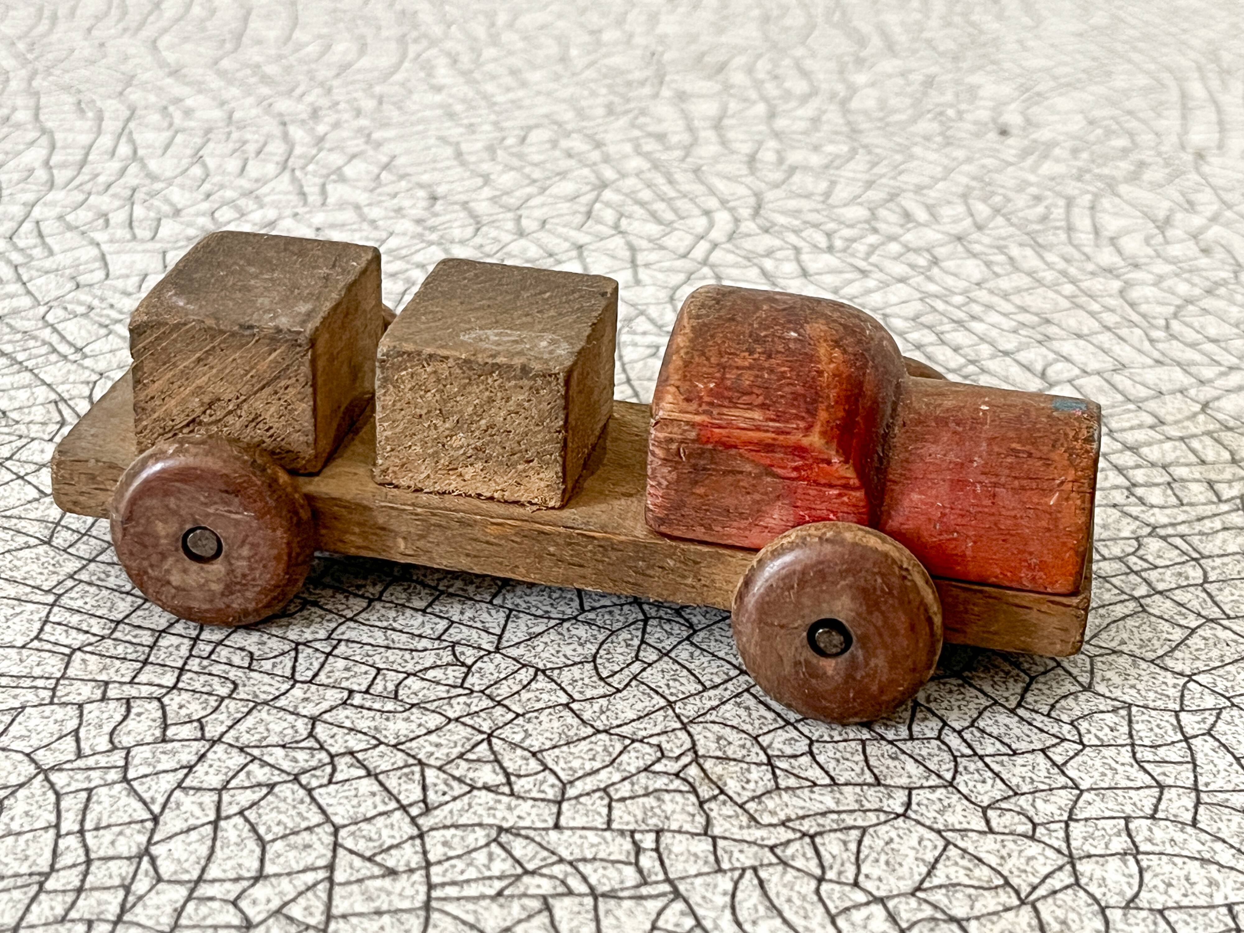 Small transporter truck, old wooden toy