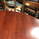 Round extendable dining table for six people, mahogany.
