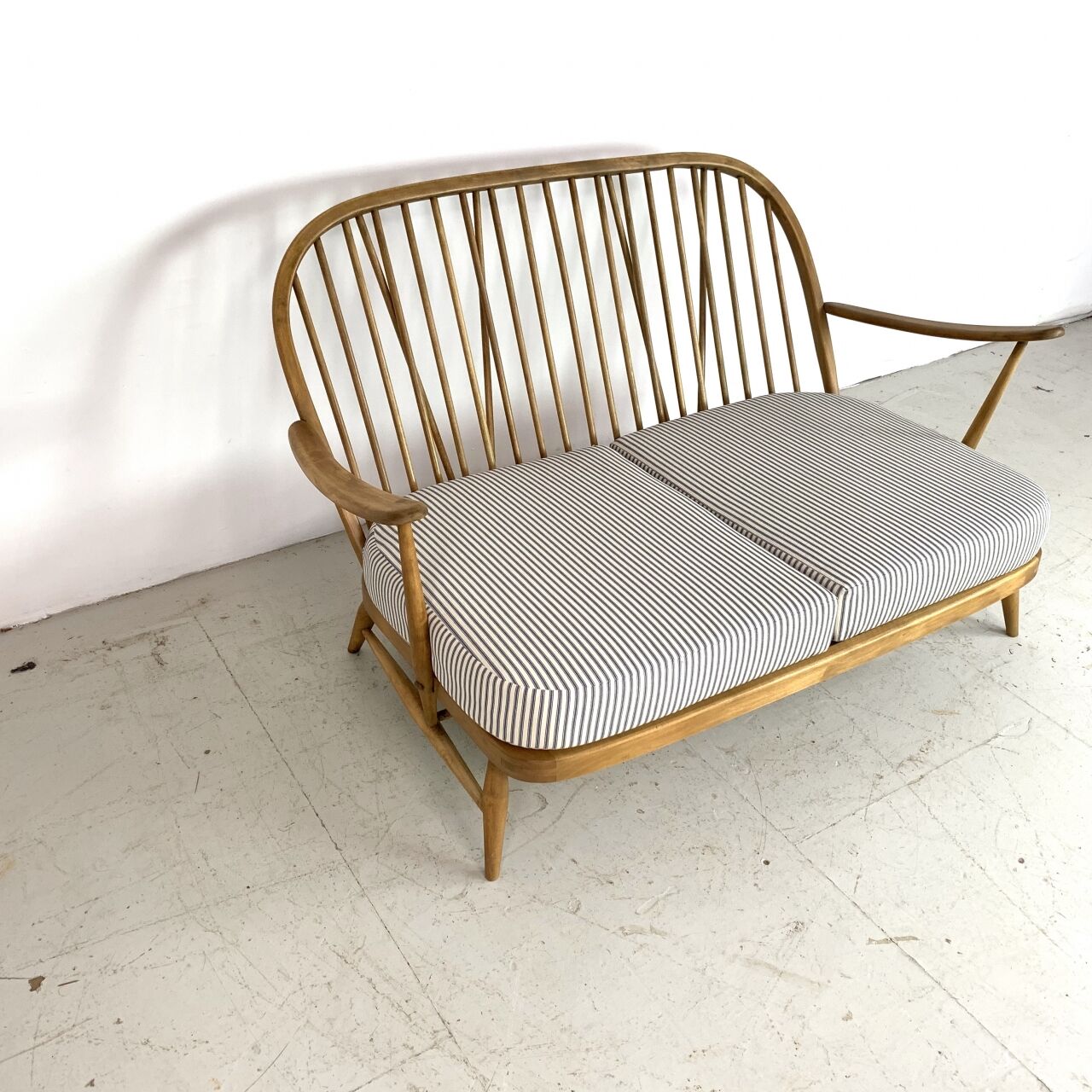 Vintage ercol windsor 2-seater sofa padded in French tick