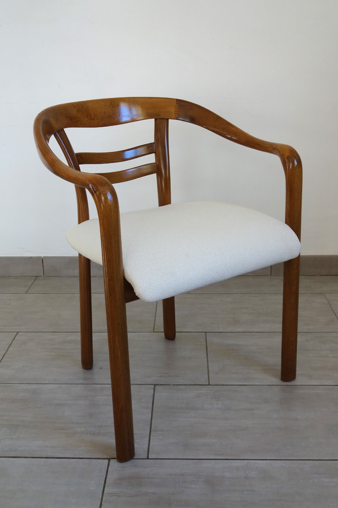 Vintage wooden armchair and thin buckle