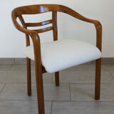 Vintage wooden armchair and thin buckle