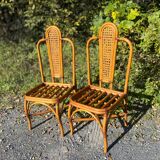 Set of two cane and rattan chairs