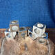Set of 6 minimalist chrome steel candle holders from the 70s.