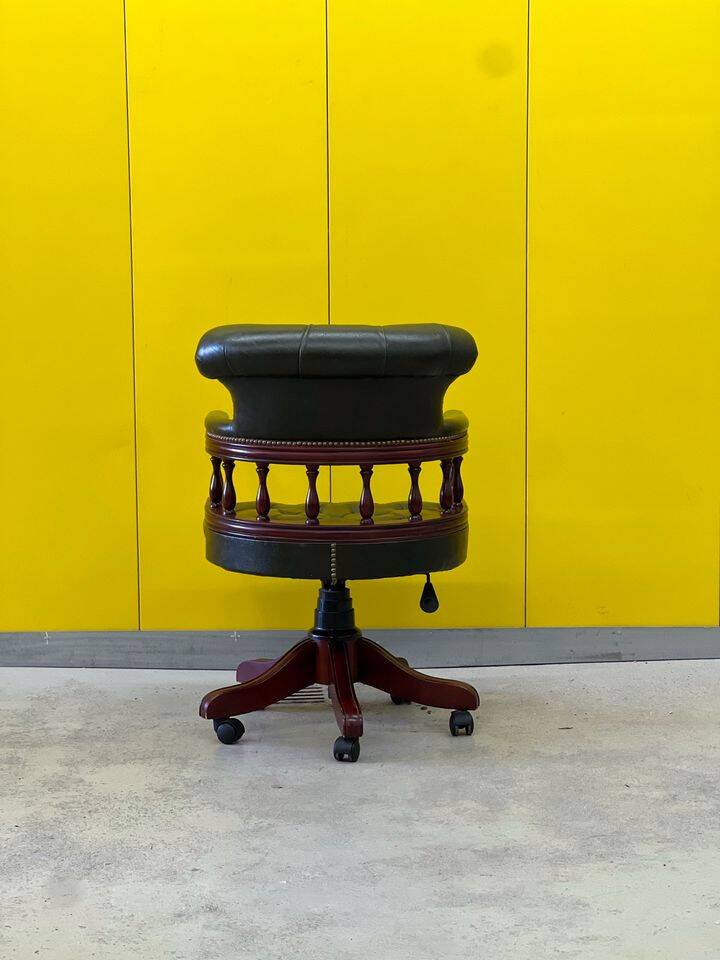 Chesterfield Revolving Captain's Chair with Green Leather Upholstery
