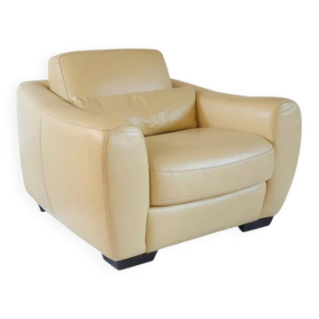 Vintage club armchair in butter yellow faux leather from the 1980s.