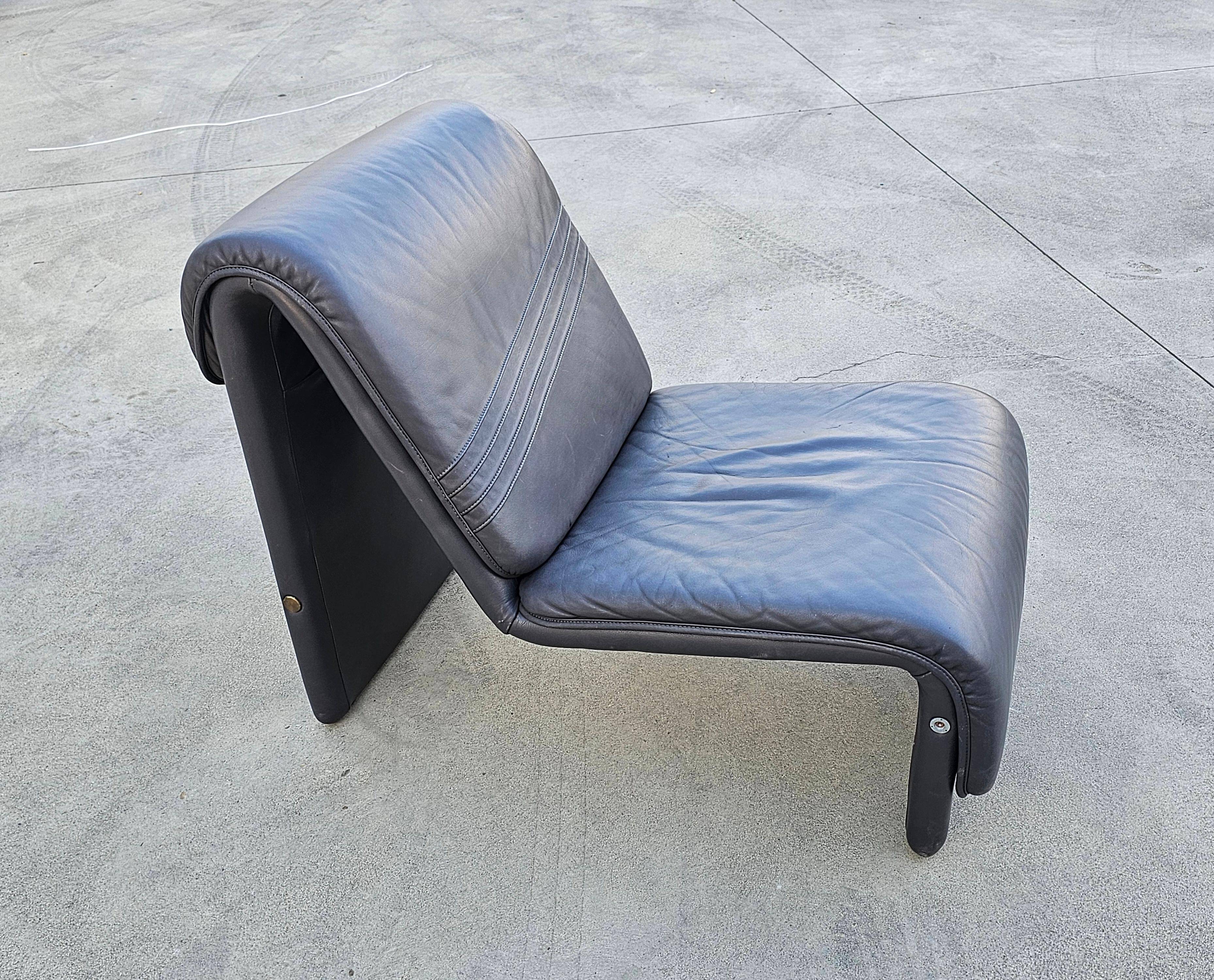 Postmodern leather lounge chairs in the style of Etienne Fermigier 1978.