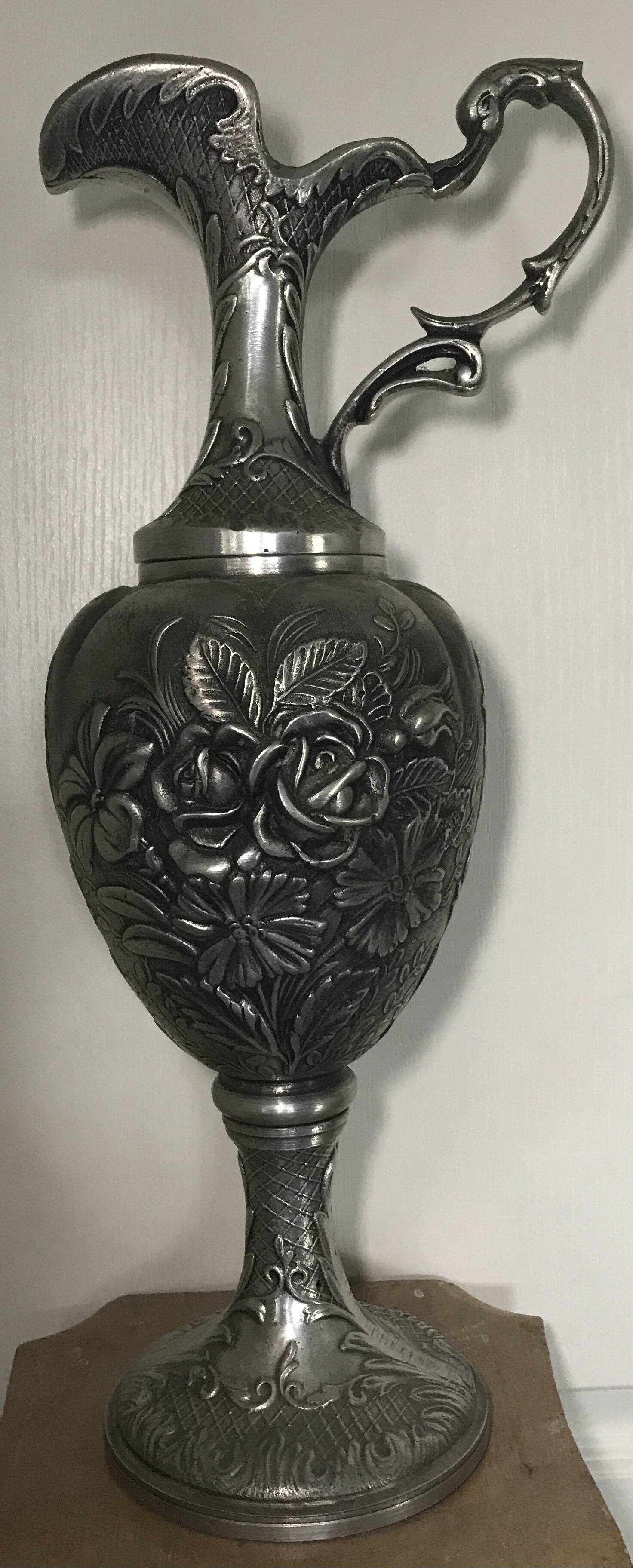 Ewer, Mauro Manetti art foundry, floral embossed decoration and bird's head handle