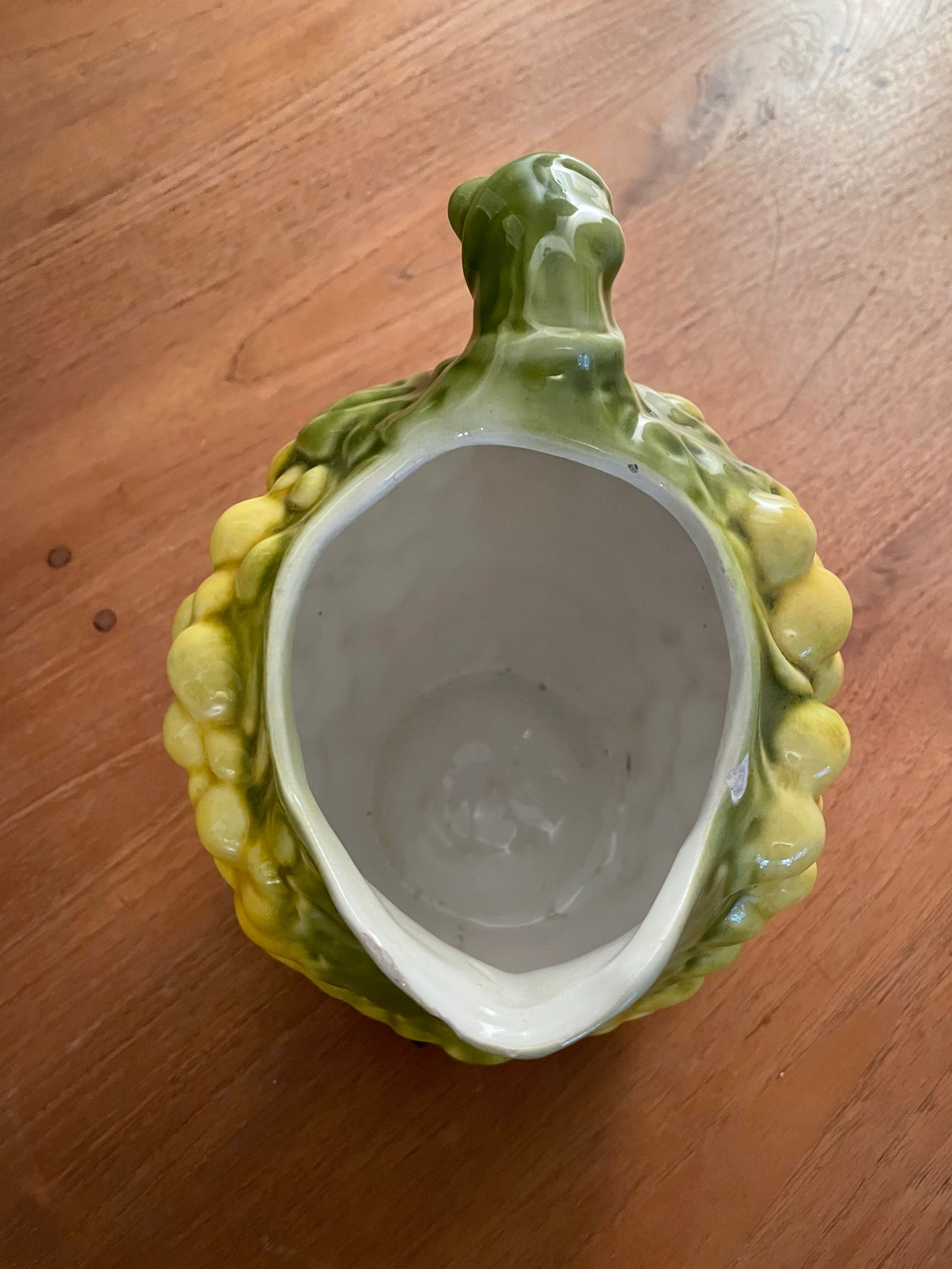 Pitcher bunch yellow and green grape slurry