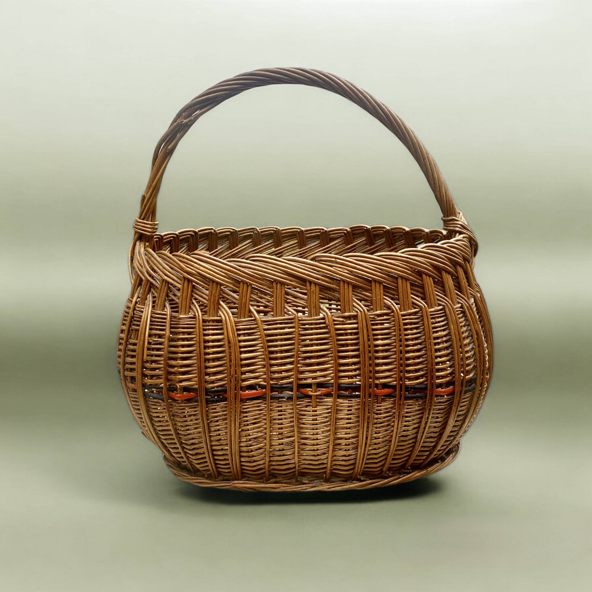 Old woven wicker basket and scoubidou