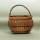 Old woven wicker basket and scoubidou