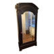 Black wardrobe with a mirrored door in ebony finish.