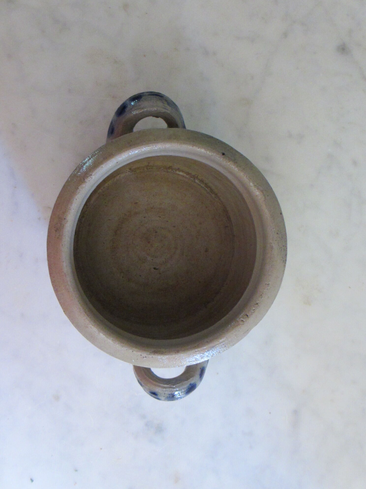 Old pot in reeds