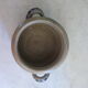 Old pot in reeds