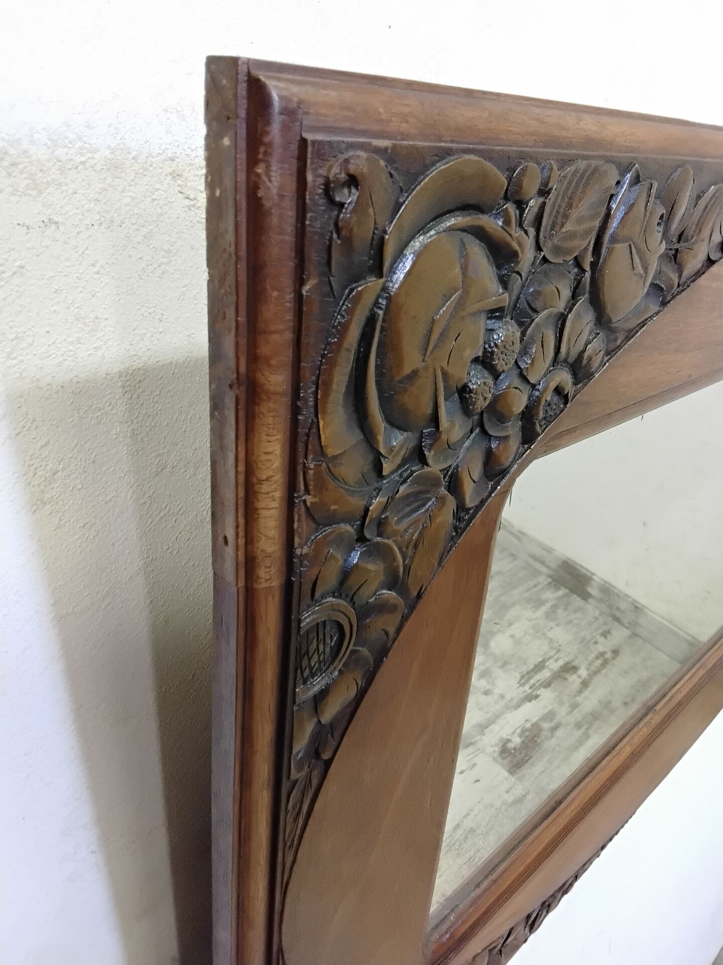 Art Deco mirror with a wooden frame