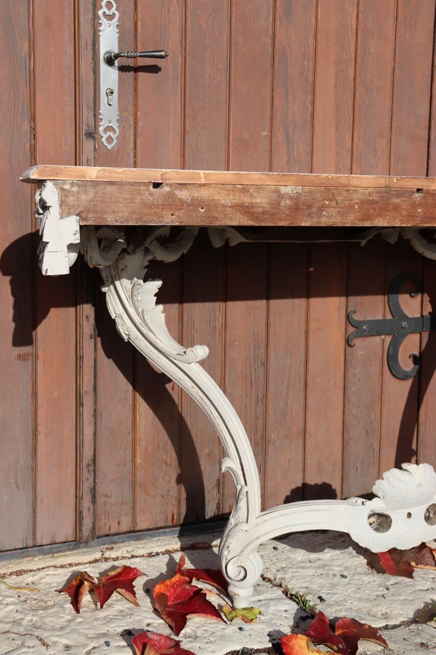 Carved wooden console