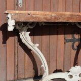 Carved wooden console