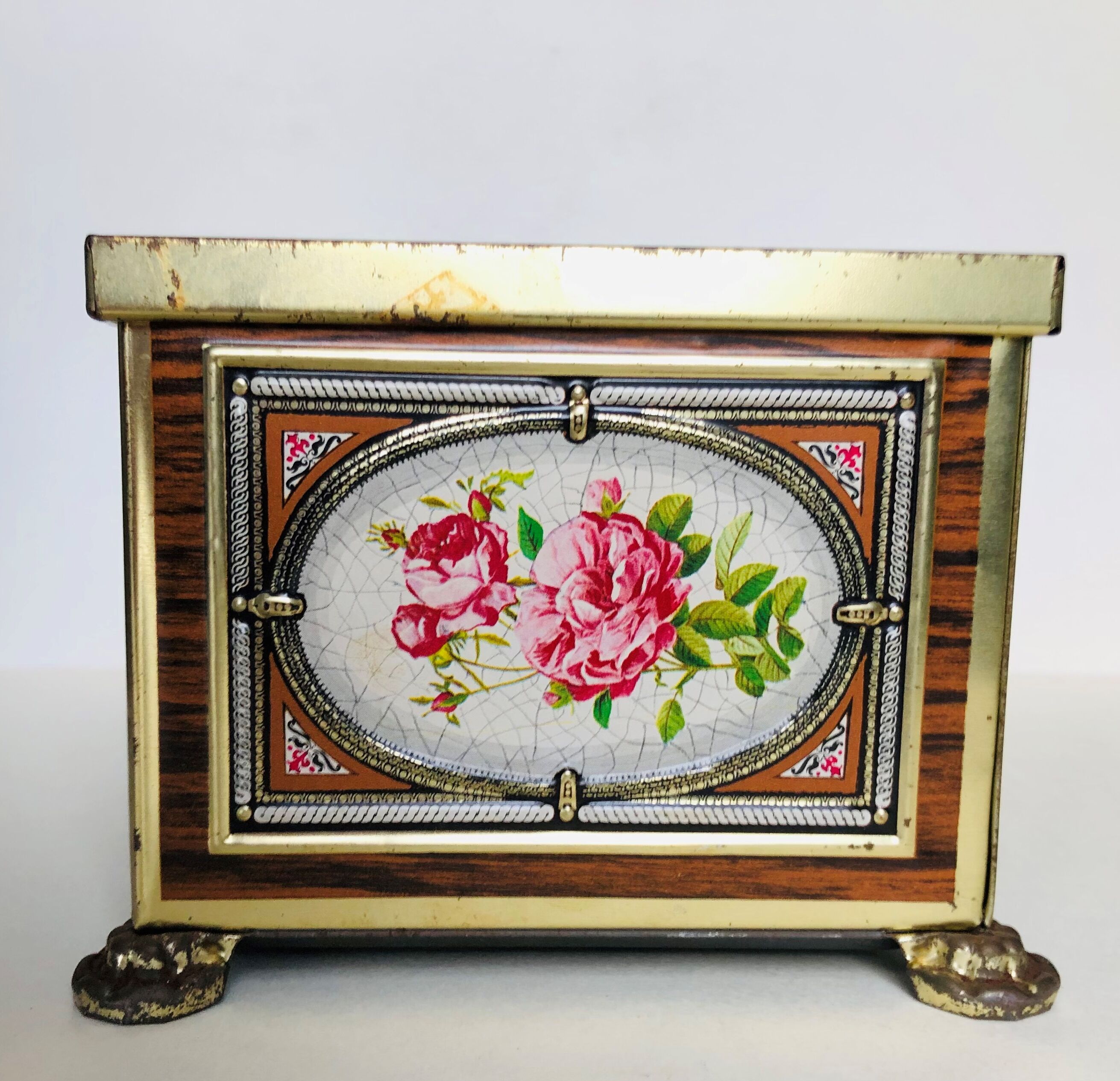 Old metal box decorated with flowers