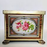 Old metal box decorated with flowers